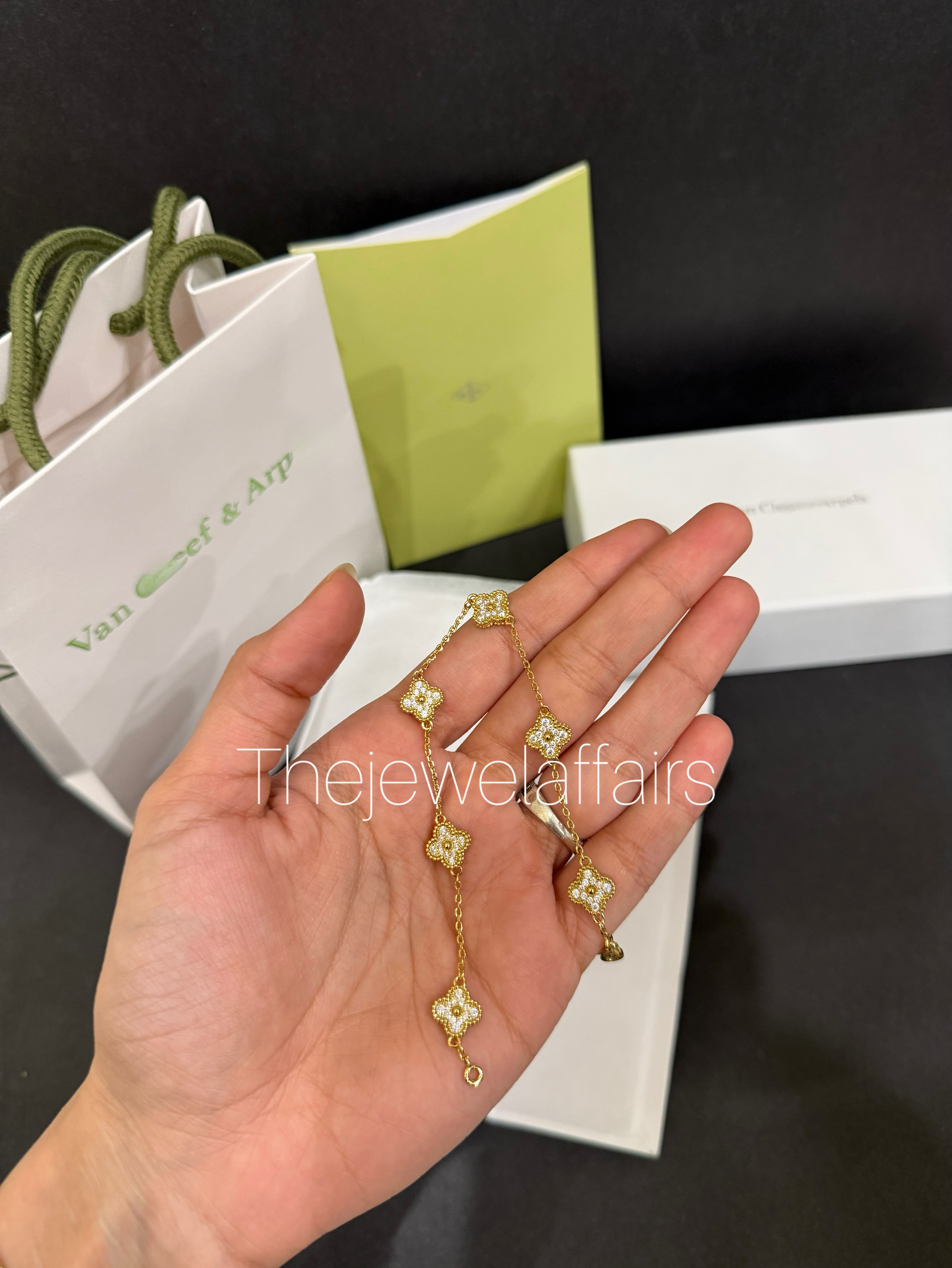 V@ncleef and arpe!s 6 mini gold studded clovers bracelet