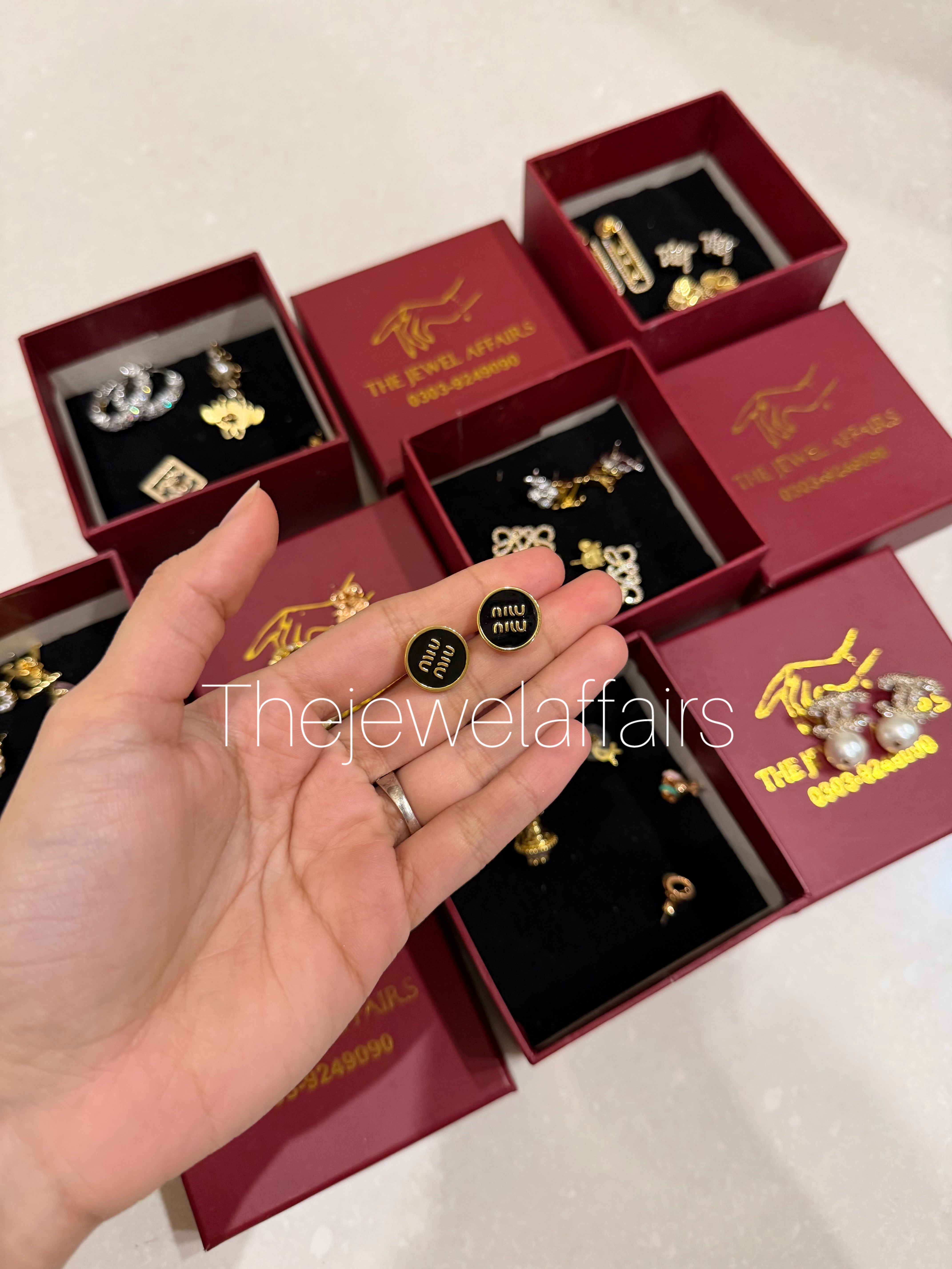 M!uM!u Black Enameled Studs