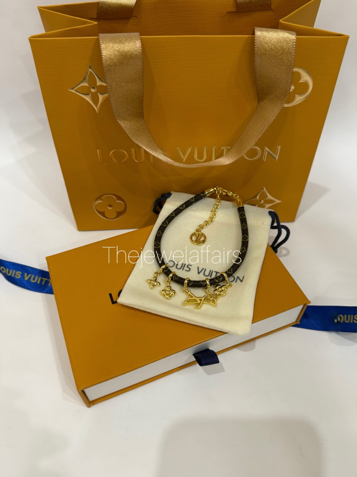 Lo!us vuitt0n Monogram Canvas Charm Bracelet with Gold Tone Charms (WITHOUT BRAND PACKAGING)